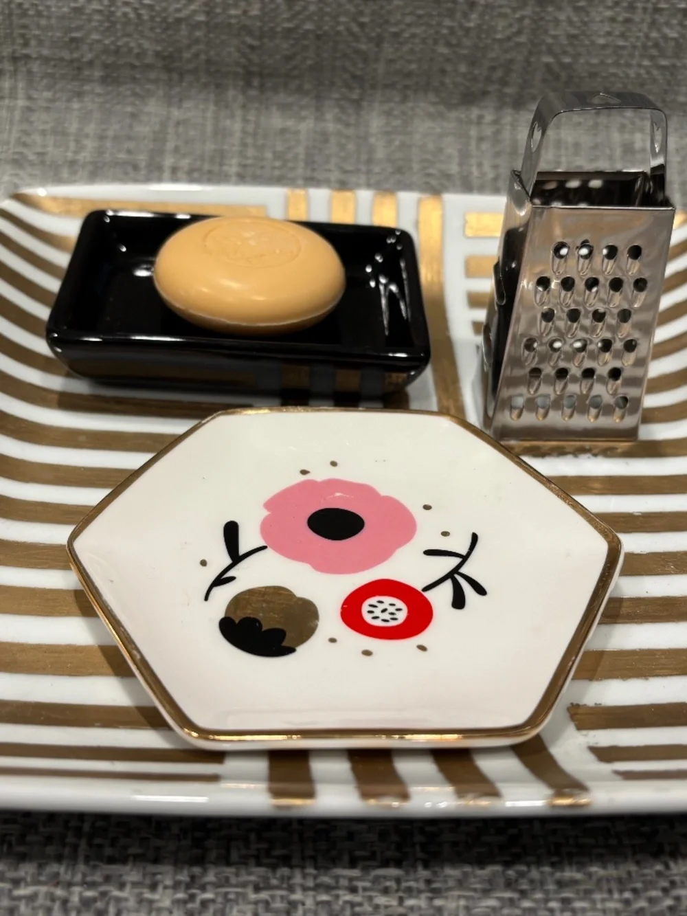 gold painted tray soap grating practical life lesson by idlewild montessori